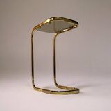 C. 1970 - Pair of side tables in gilded metal and smoked glass -