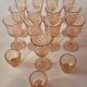 set of 12 stemmed glasses and 3 small vintage pink liqueur glasses in rosaline