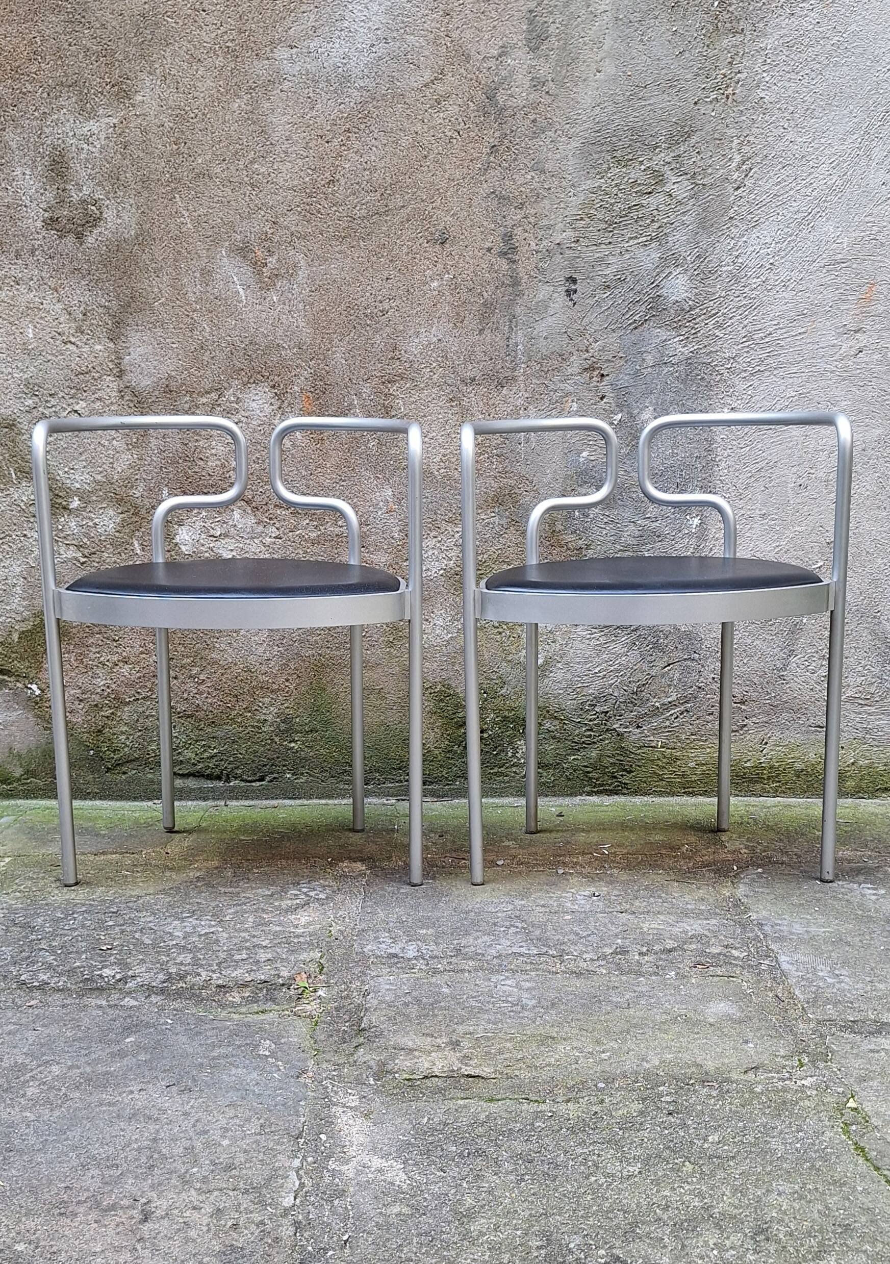 Pair of aluminum armchairs by Henning Larsen