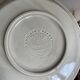 Italian ceramic plates with floral fruit designs.