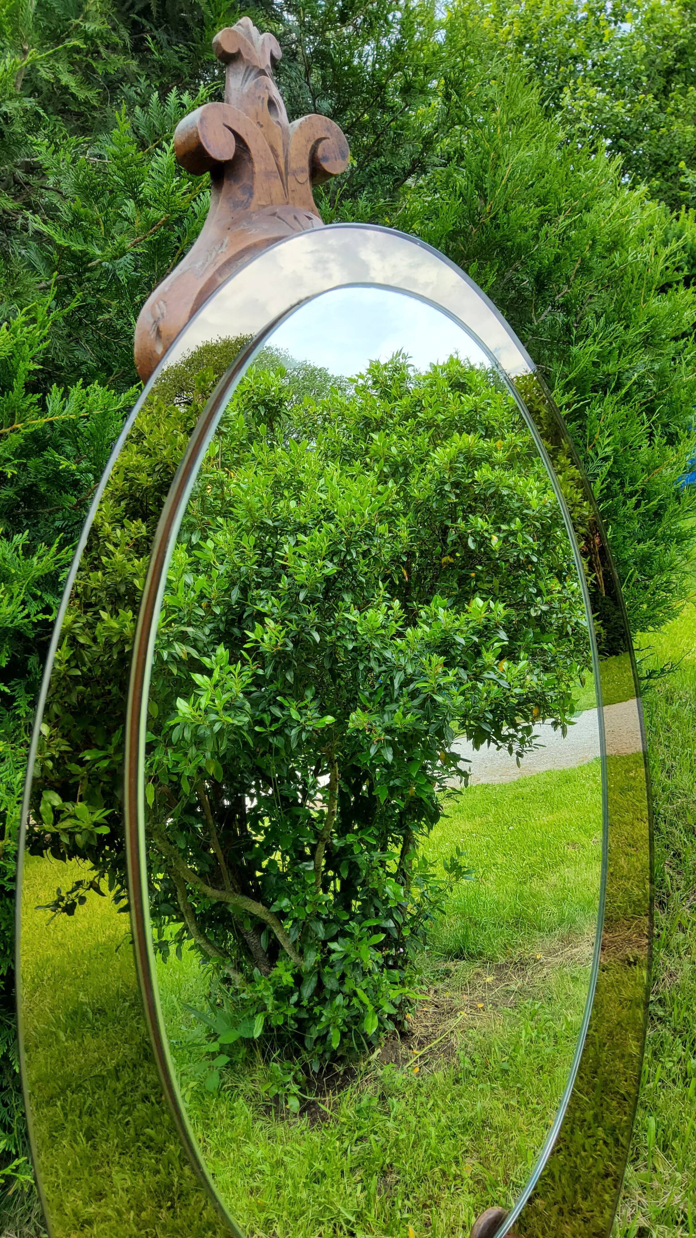 Oval Italian mirror of the 70s two complexions