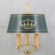 Empire style hot water bottle lamp in solid bronze three lights Lucien Gau