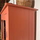 Antique glass-fronted terracotta cupboard