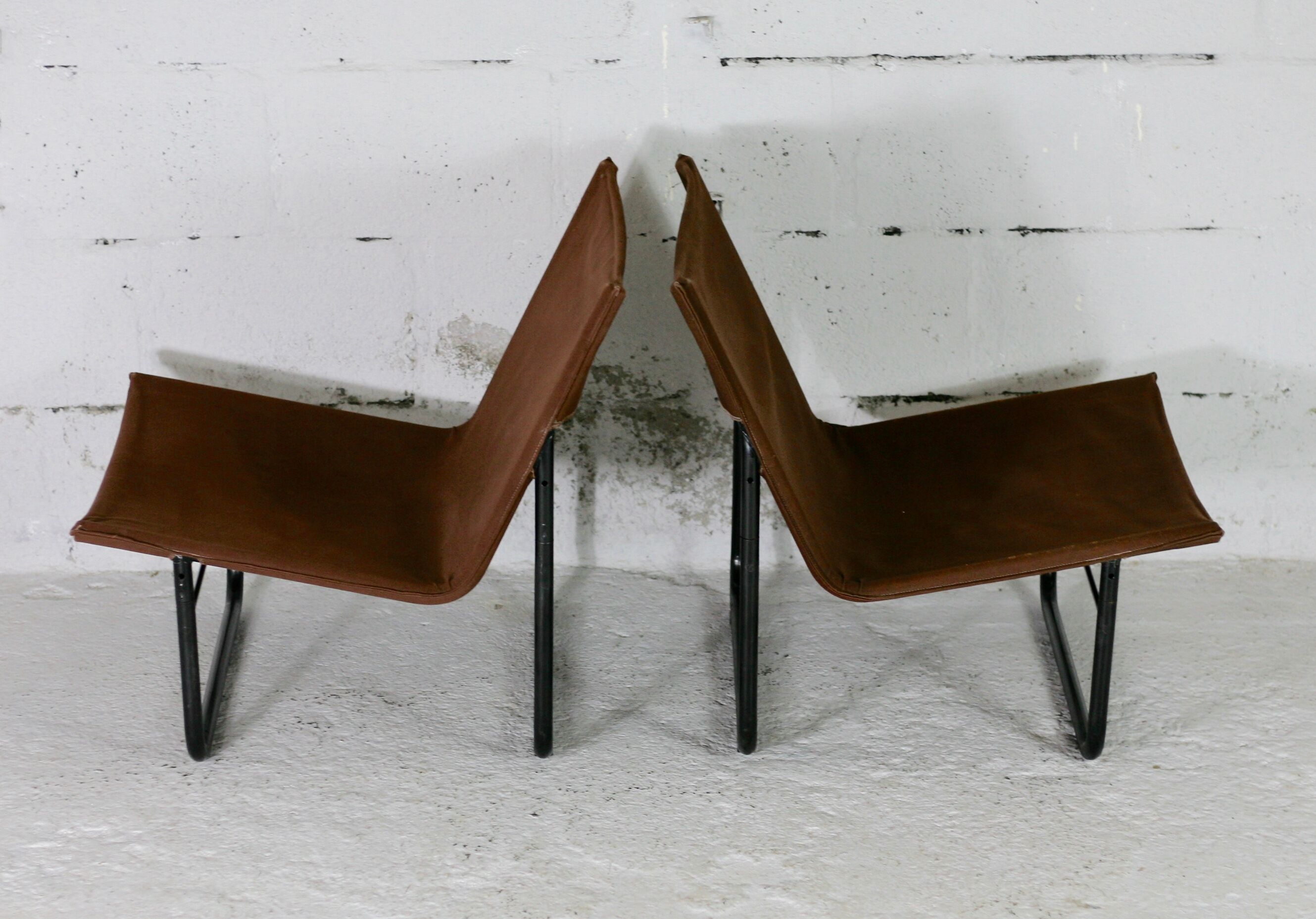 Pair of KEBE drivers, Denmark, circa 1975. Steel and "chocolate" canvas