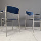 Minimalist metal and plywood stackable armchairs by Gijs Van Der Sluis