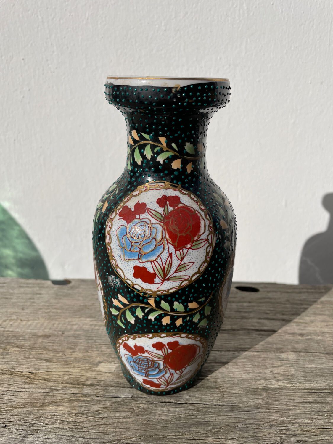 Asian vase in black ceramic with floral decoration