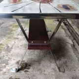 Coffee table with ceramic top.