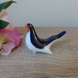 Vintage Soviet salt and pepper shaker in the shape of a cobalt blue bird.