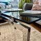 Chrome and smoked glass coffee table on wheels 1970