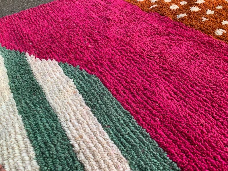 Handwoven Berber rug with traditional colorful patterns, size 150 x 250 cm