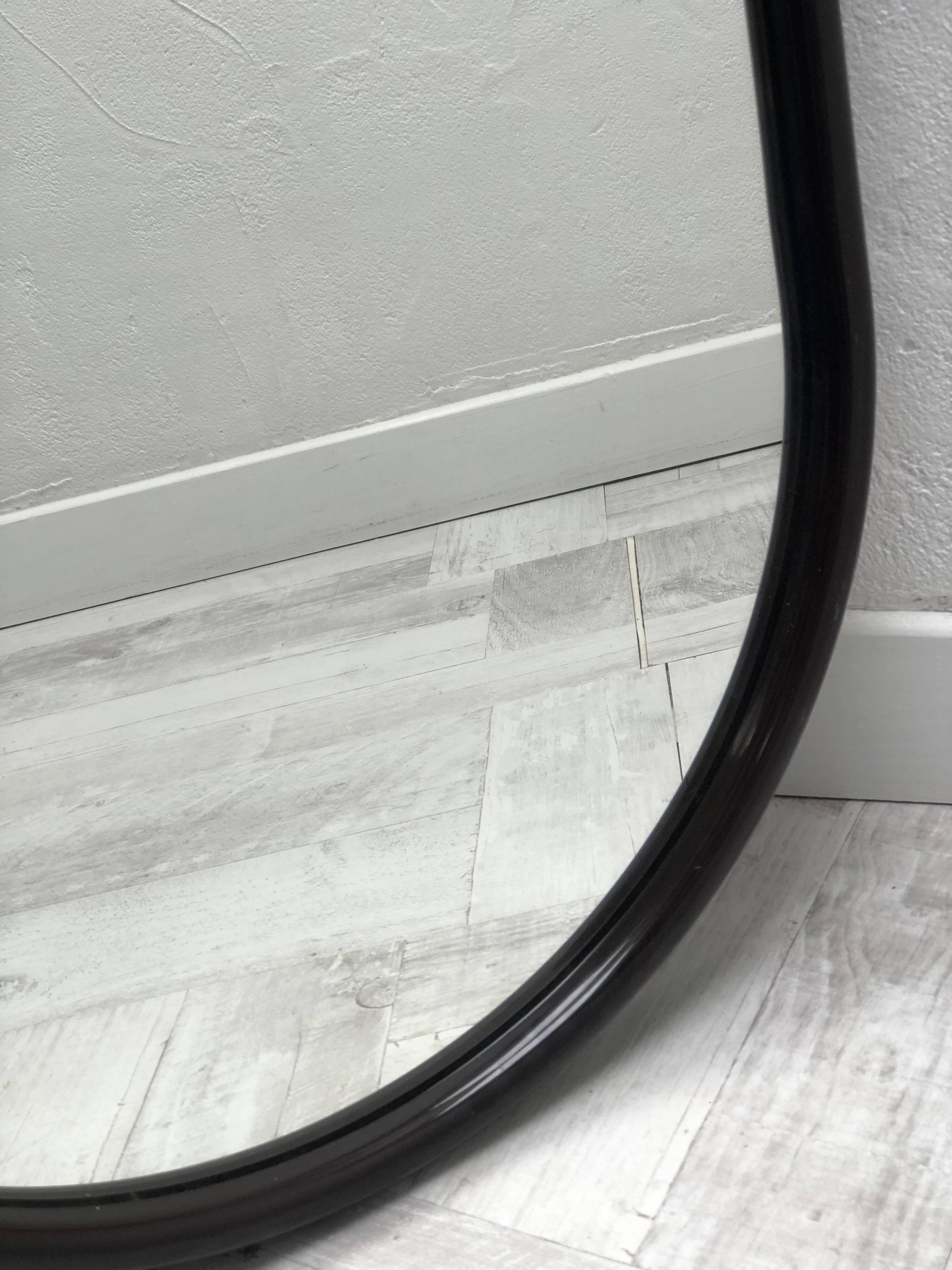 Brown plastic oval mirror, 1960s/1970s