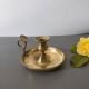 brass candle holder with old cellar rat thumb
