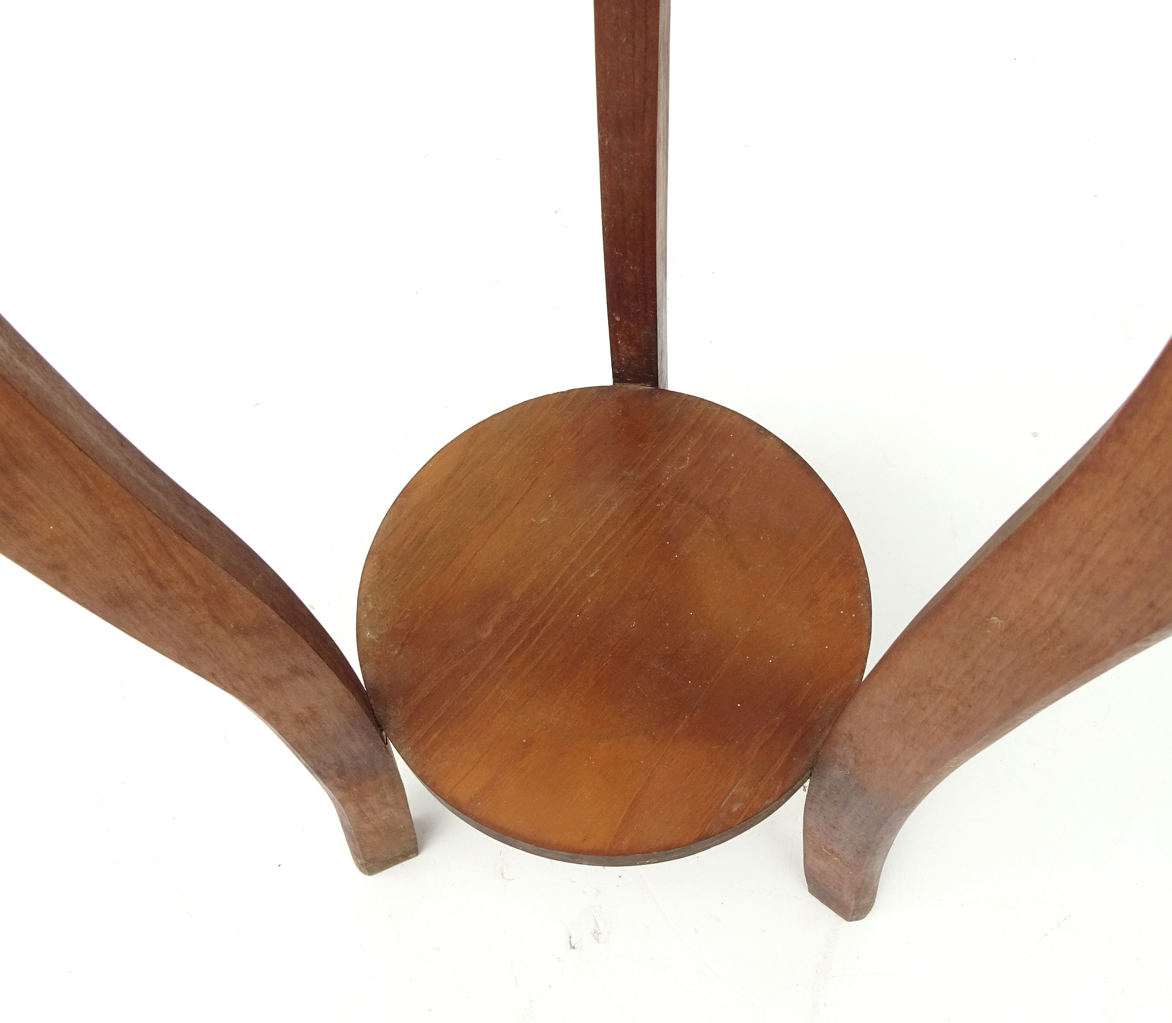 Wooden pedestal table