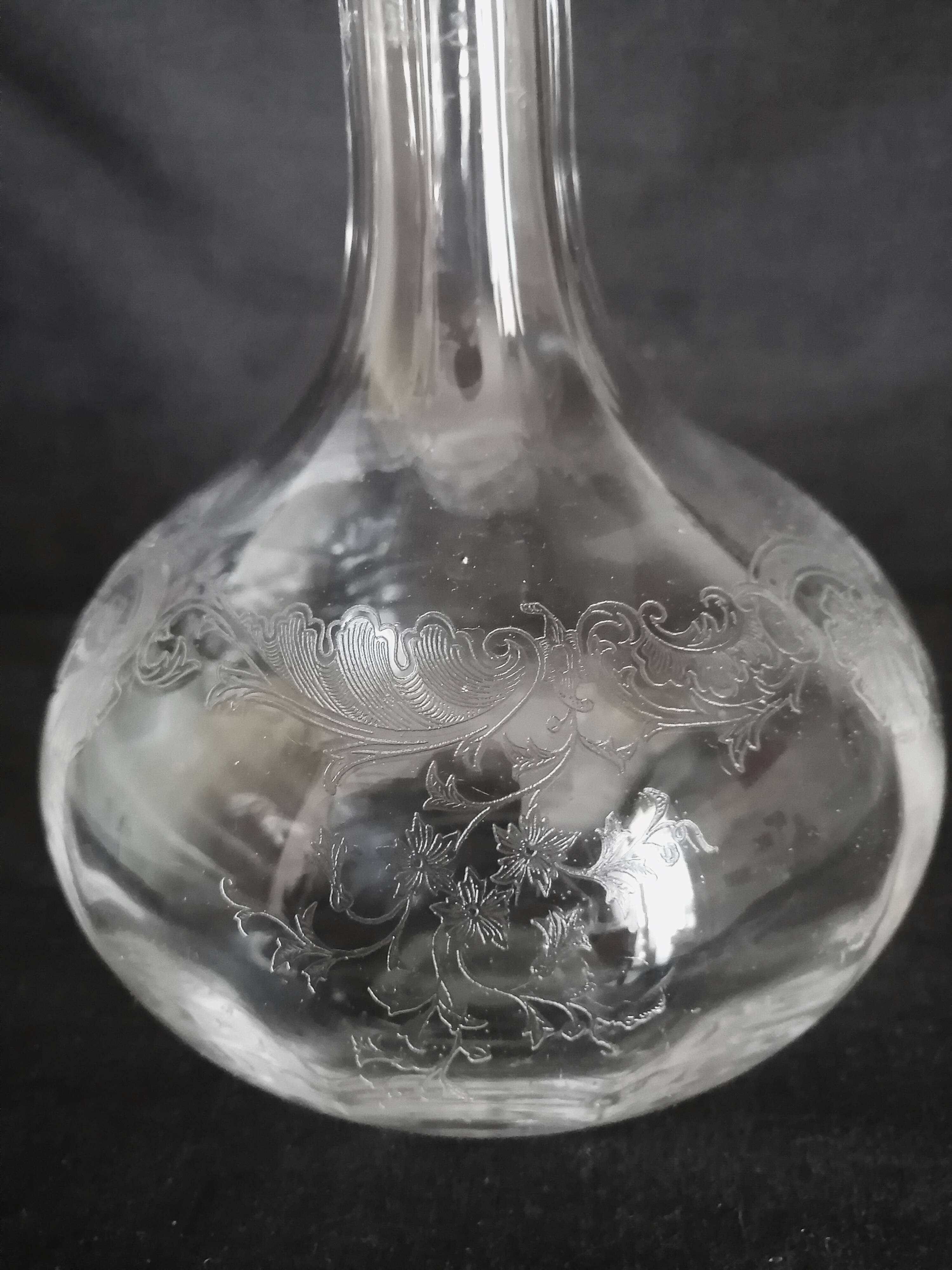 9 crystal white wine glasses from St. Louis model Cléo and their decanter.