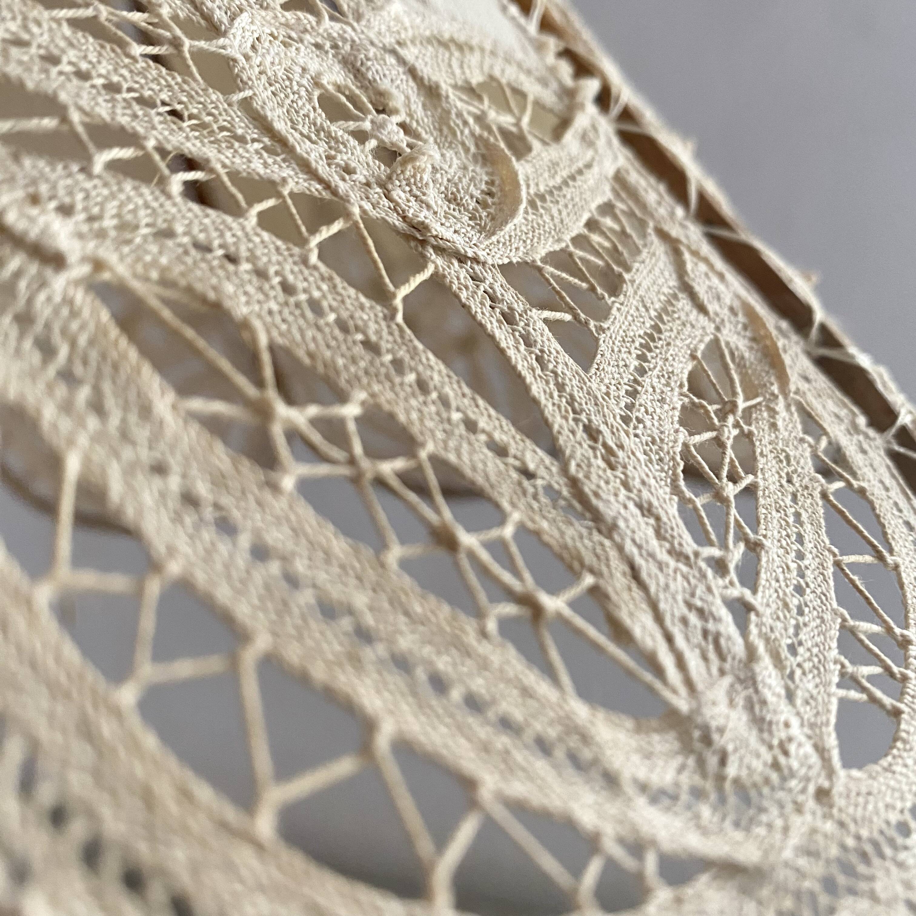 Antique hanging lampshade in rattan and openwork embroidered fabric