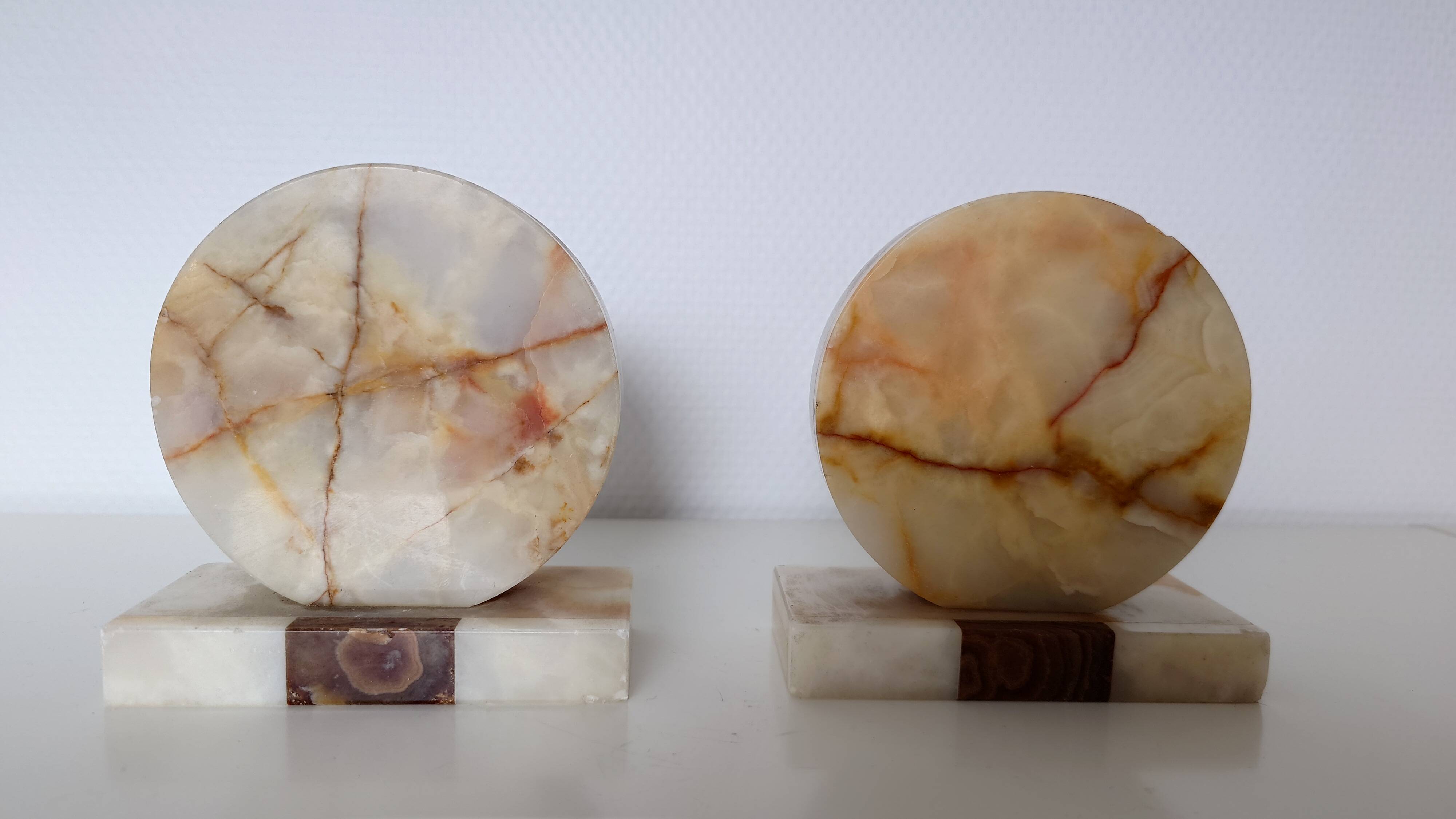 Pair of marble and onyx bookends, geometric design, Art Deco style.