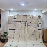Modern Moroccan Beni Ouarain rug with blue geometric lines