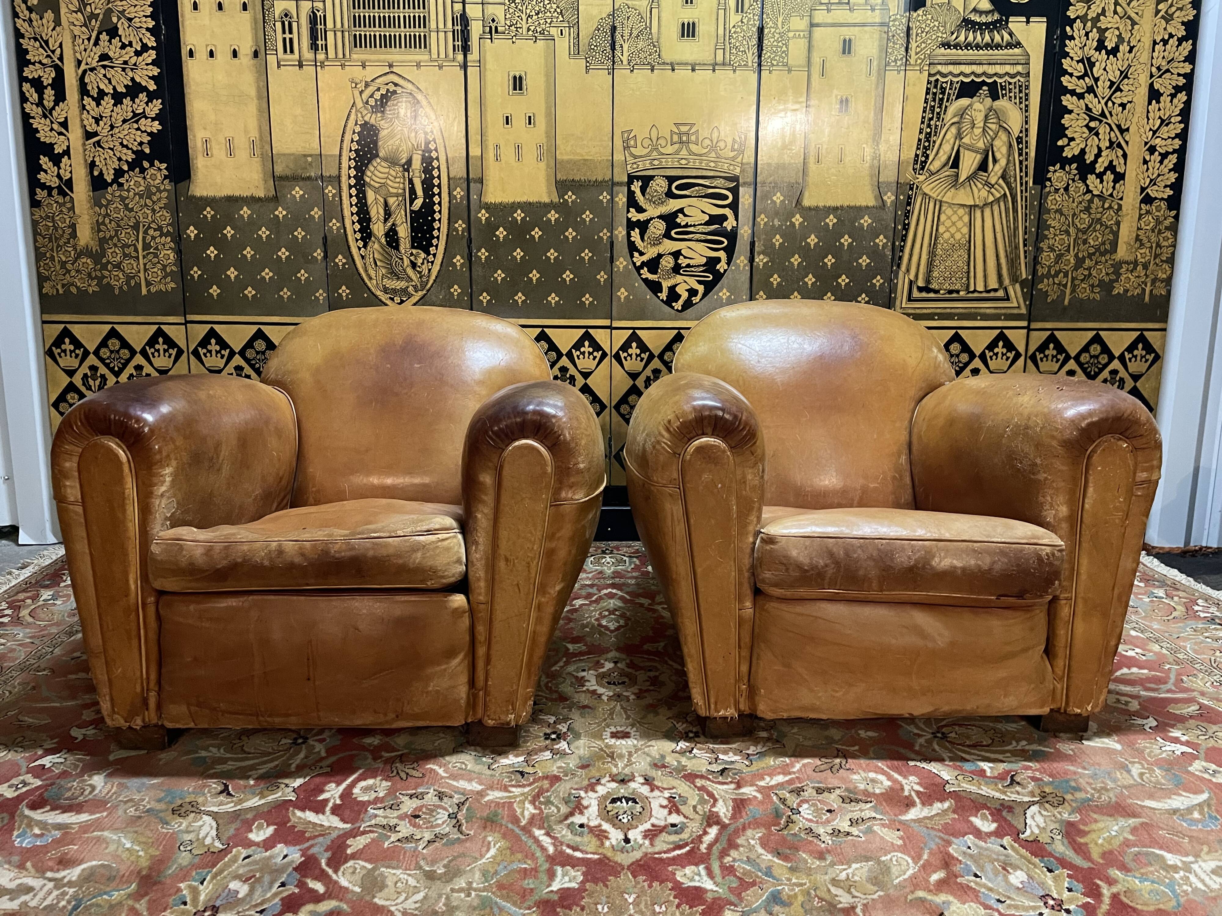 Pair of club armchairs in Havana leather 1950