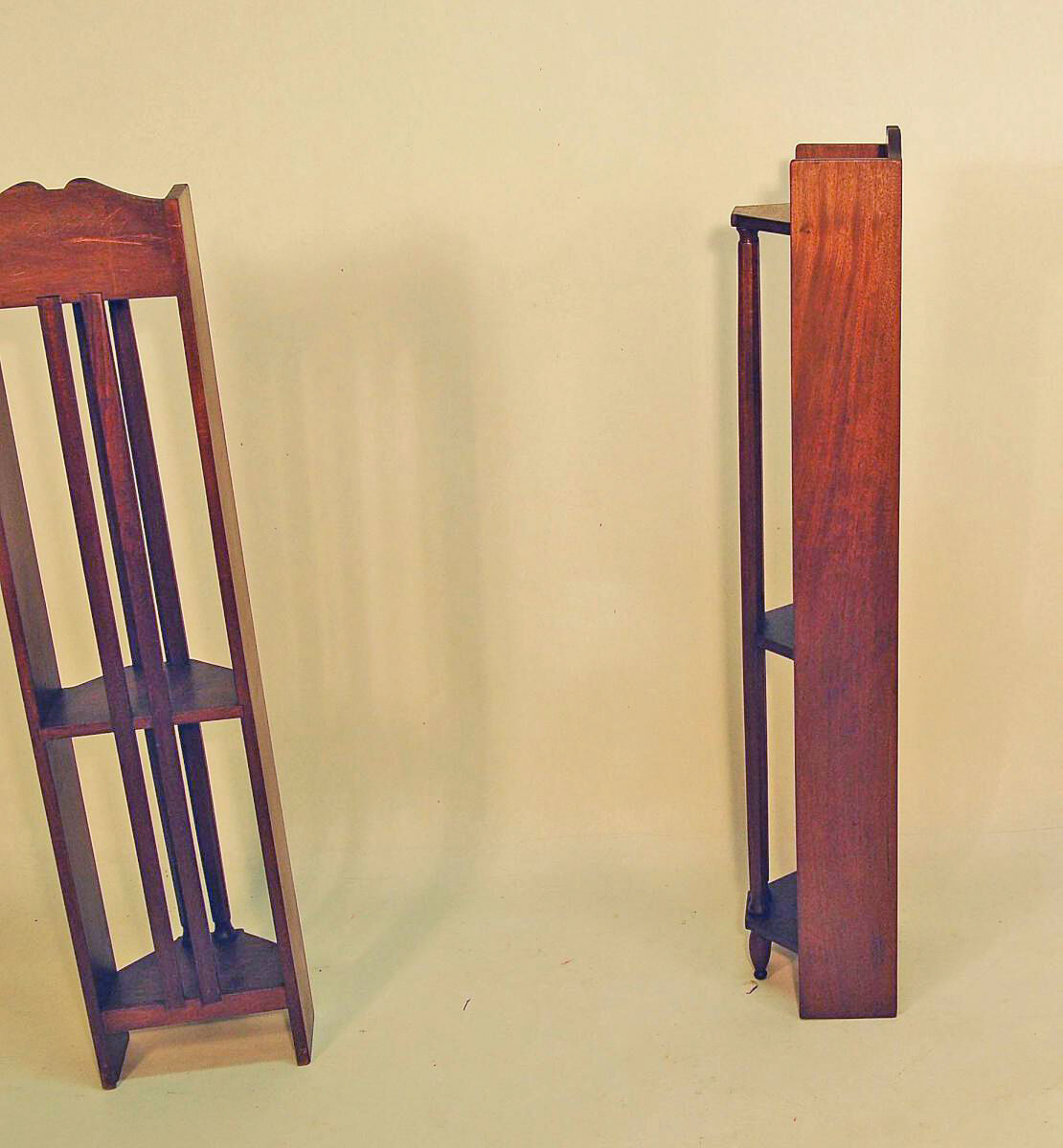 Pair of art deco mahogany wall columns