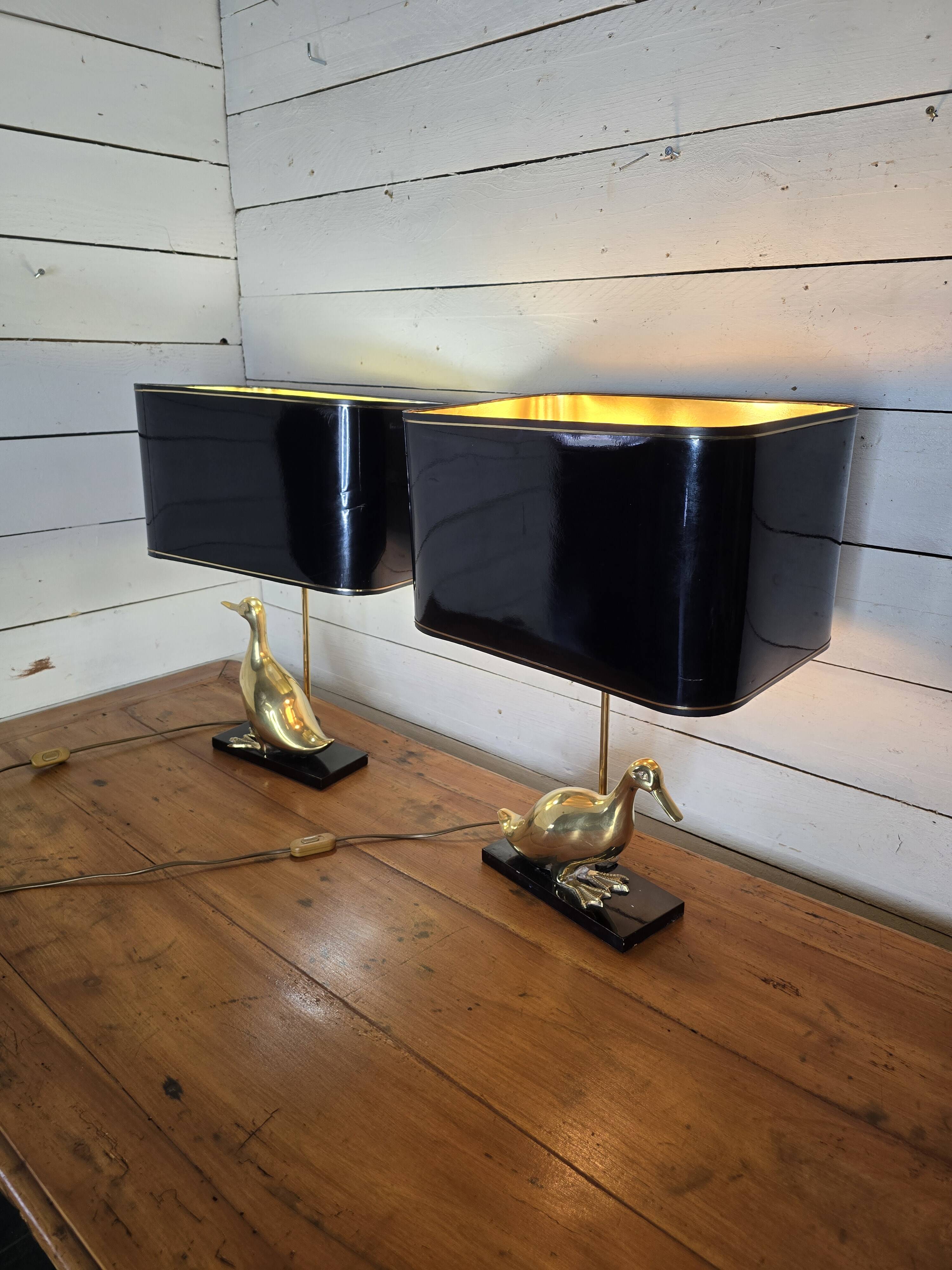 Pair of 70s table lamps featuring a brass duck