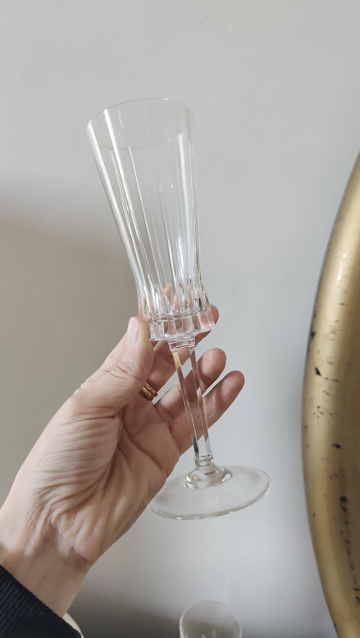 Mismatched set of prestigious crystal champagne flutes