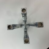 A chromed metal candle-holder "Chorus", design Karim Rashid, executed by Umbra / USA 2002