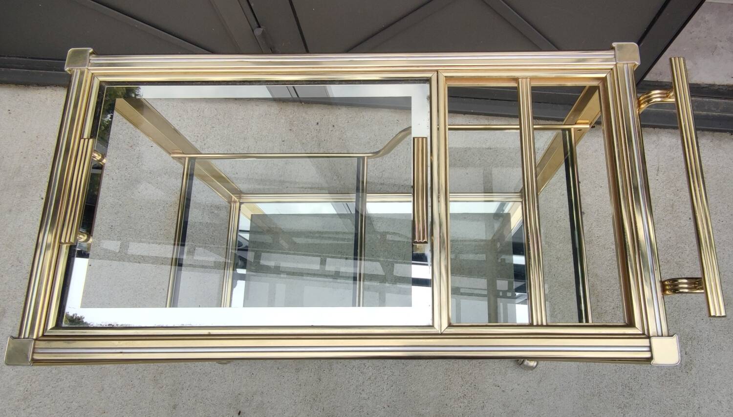 Rolling bar cart, gold-tone metal design, 1970s