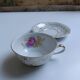 Large porcelain cup from Bavaria with a pearlescent finish and rose decorations.