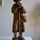 Grande sculpture bois d'un homme avec sa pelle à grain 52 cm