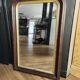 Louis-Philippe mirror in old wood and patinated gilded surround