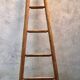 Wooden triangular ladder