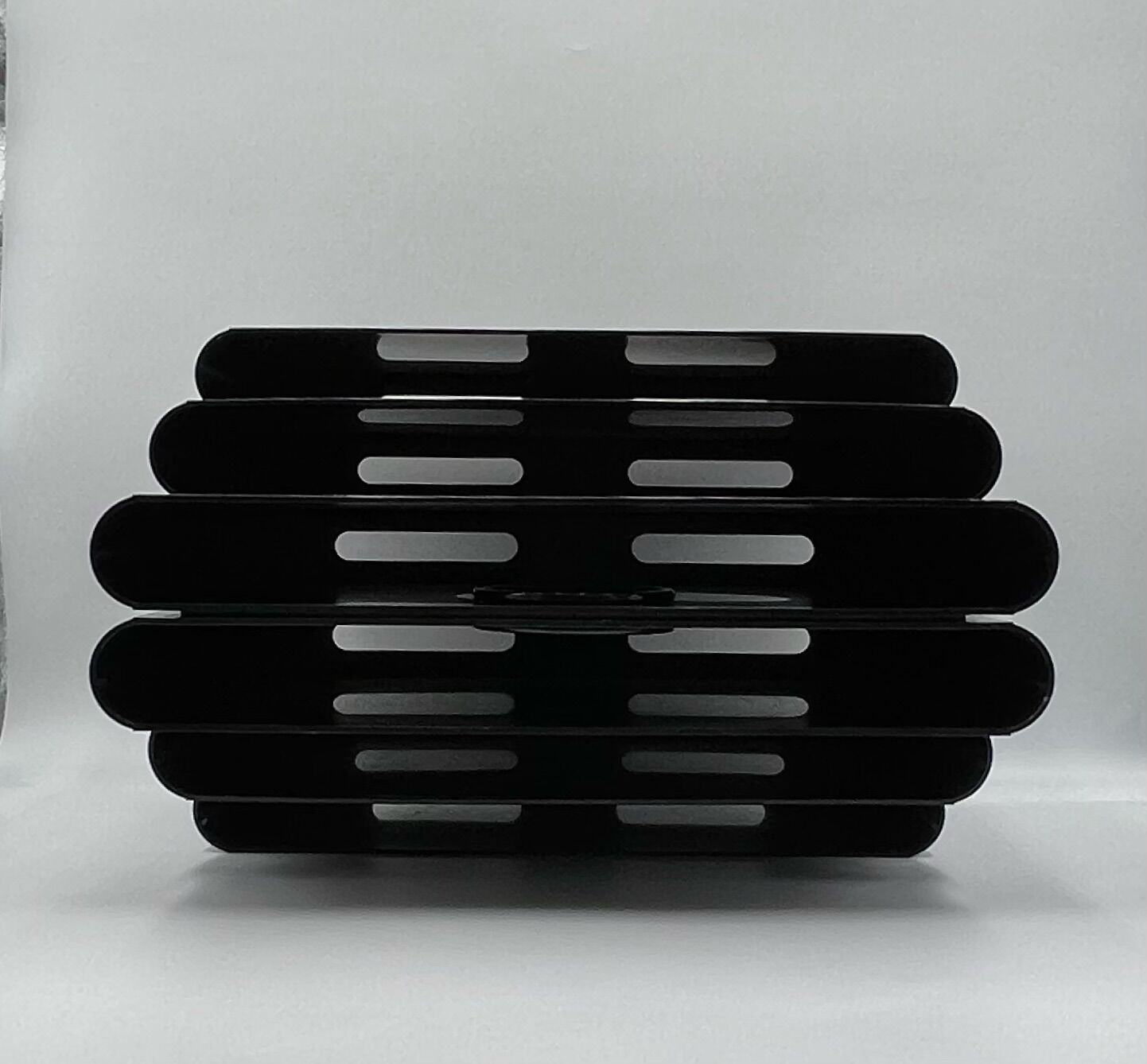 Magazine holder by Giotto Stoppino for Kartell 1970