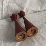 pair of Scandinavian painted wooden candle holders, minimalist atmosphere, free form