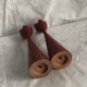 pair of Scandinavian painted wooden candle holders, minimalist atmosphere, free form