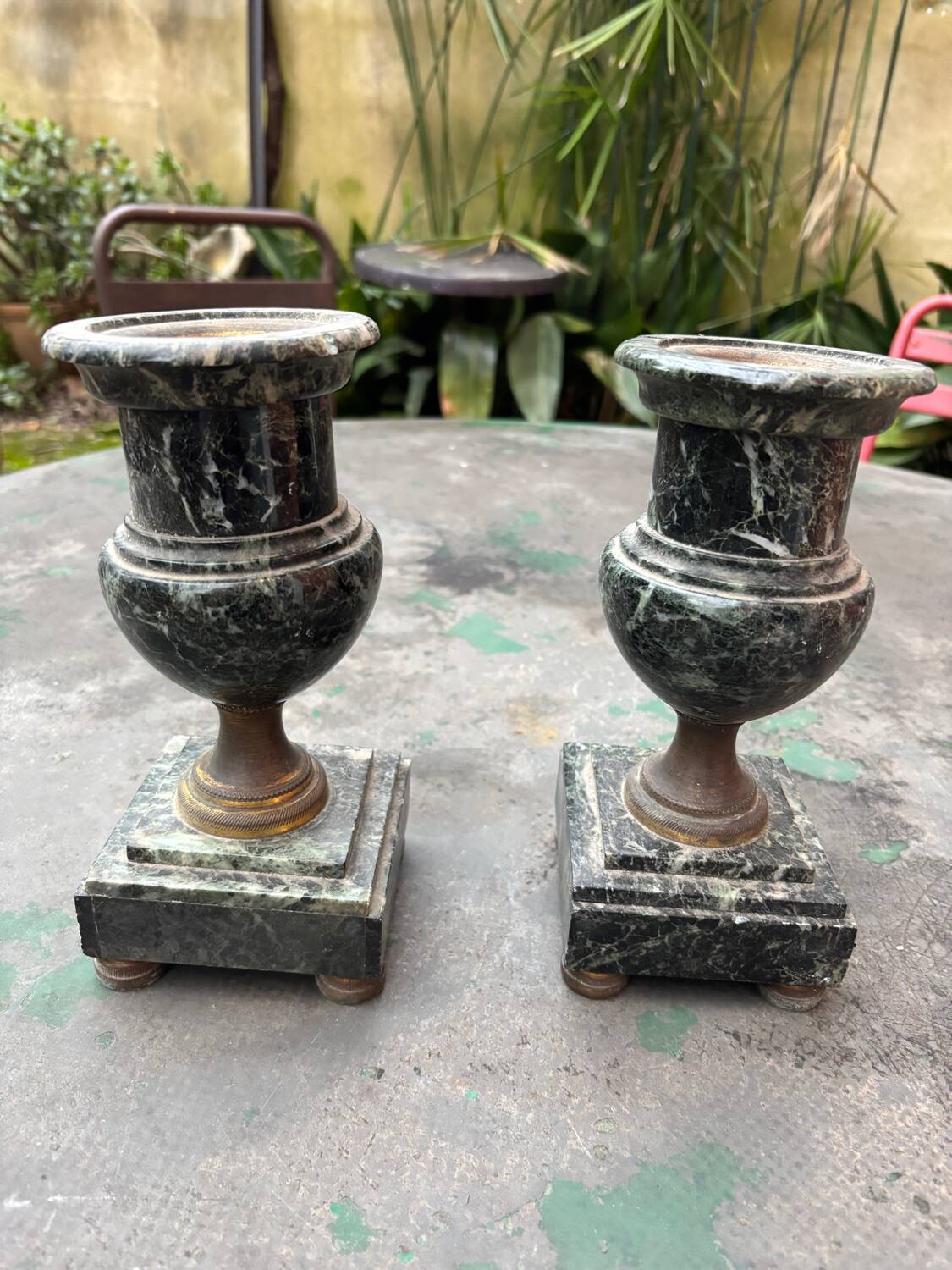 Pair of green marble vases