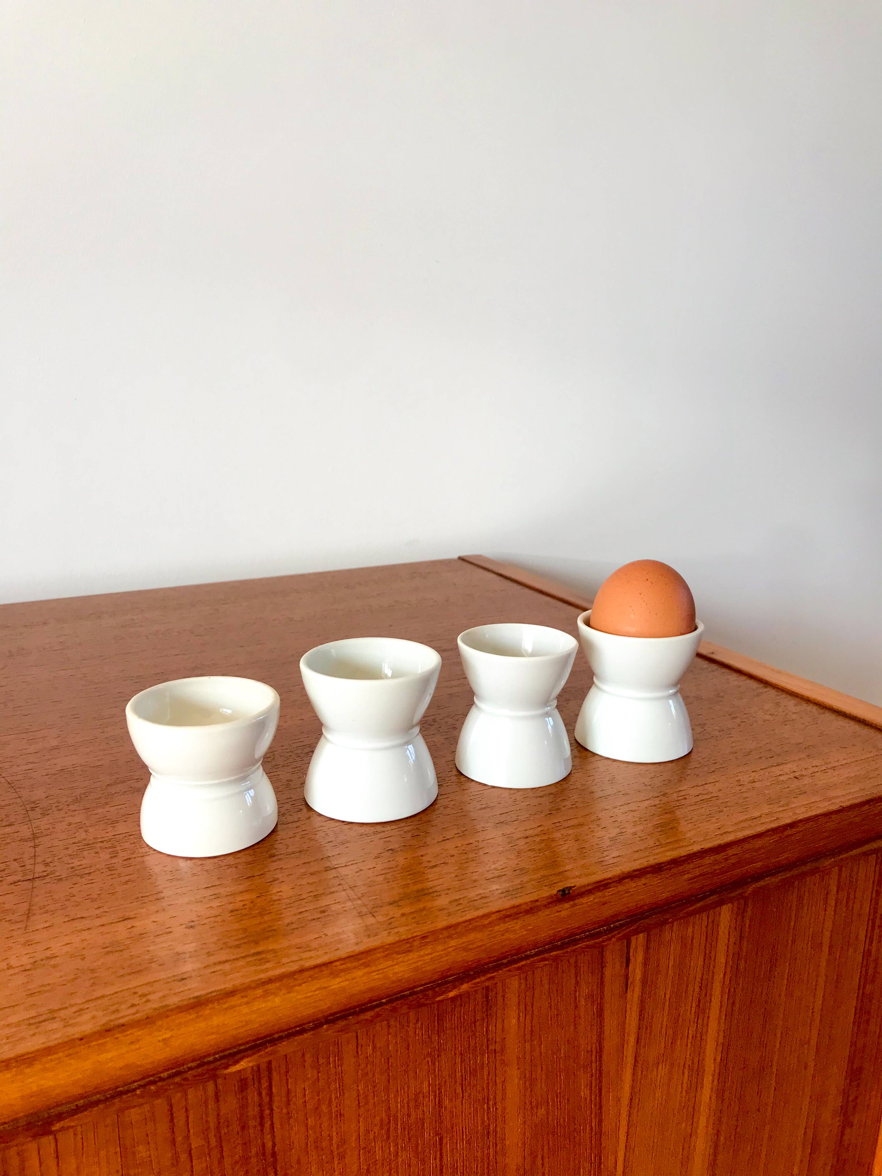 set of 4 earthenware diabolo egg cups early 20th century