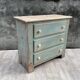Commode en bois patinée