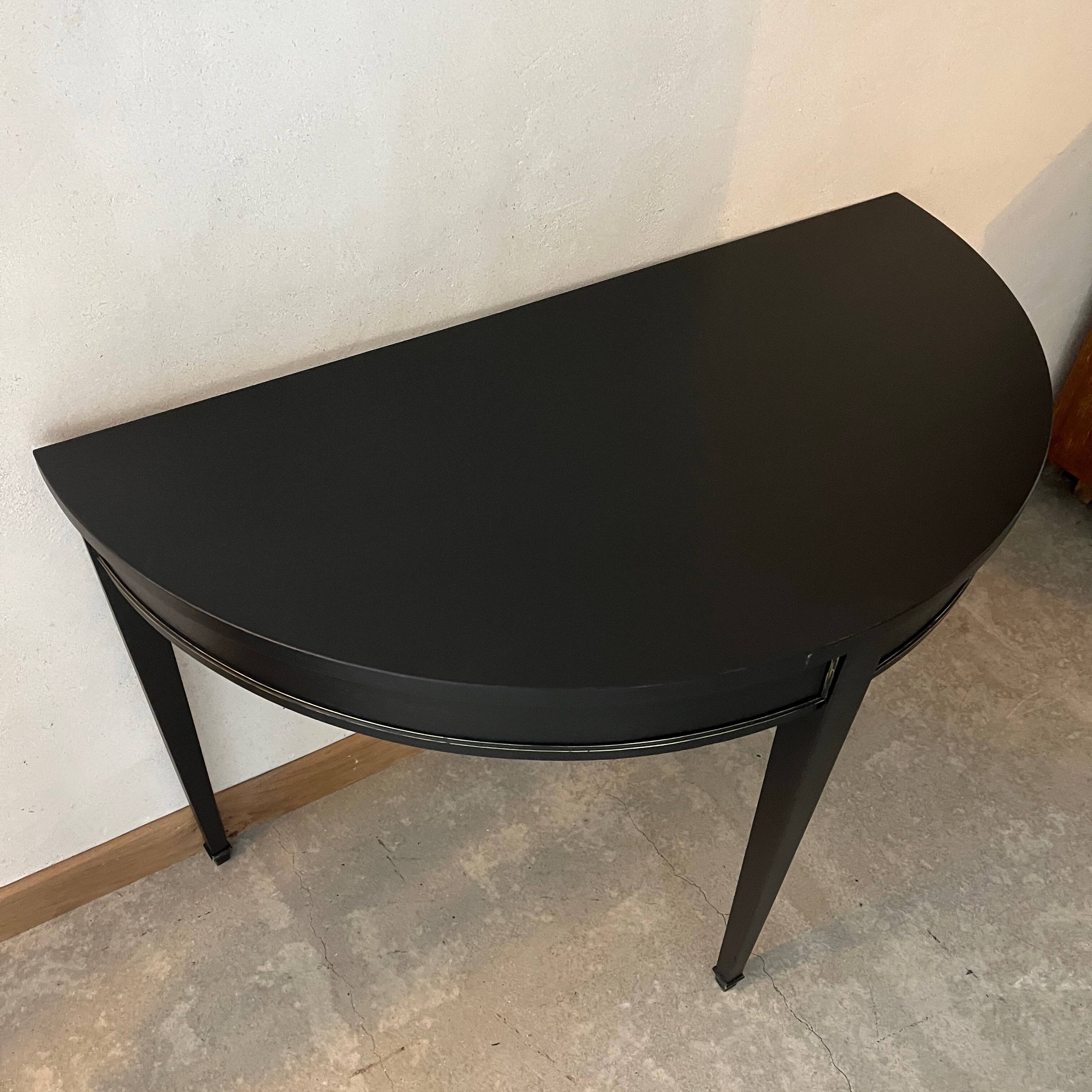 Black half-moon console