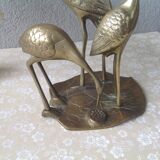 Golden brass herons