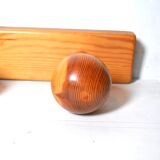 Vintage wall-mounted coat rack in solid pine.