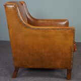 Modern charming armchair in sheepskin