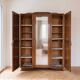 Art Deco 3-door wardrobe in carved wood with mirror