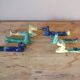 6 knife-wielding colorful ceramic dogs 60s