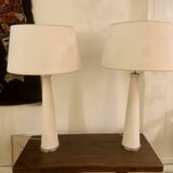 Pair of modernist stone and bronze lamps.