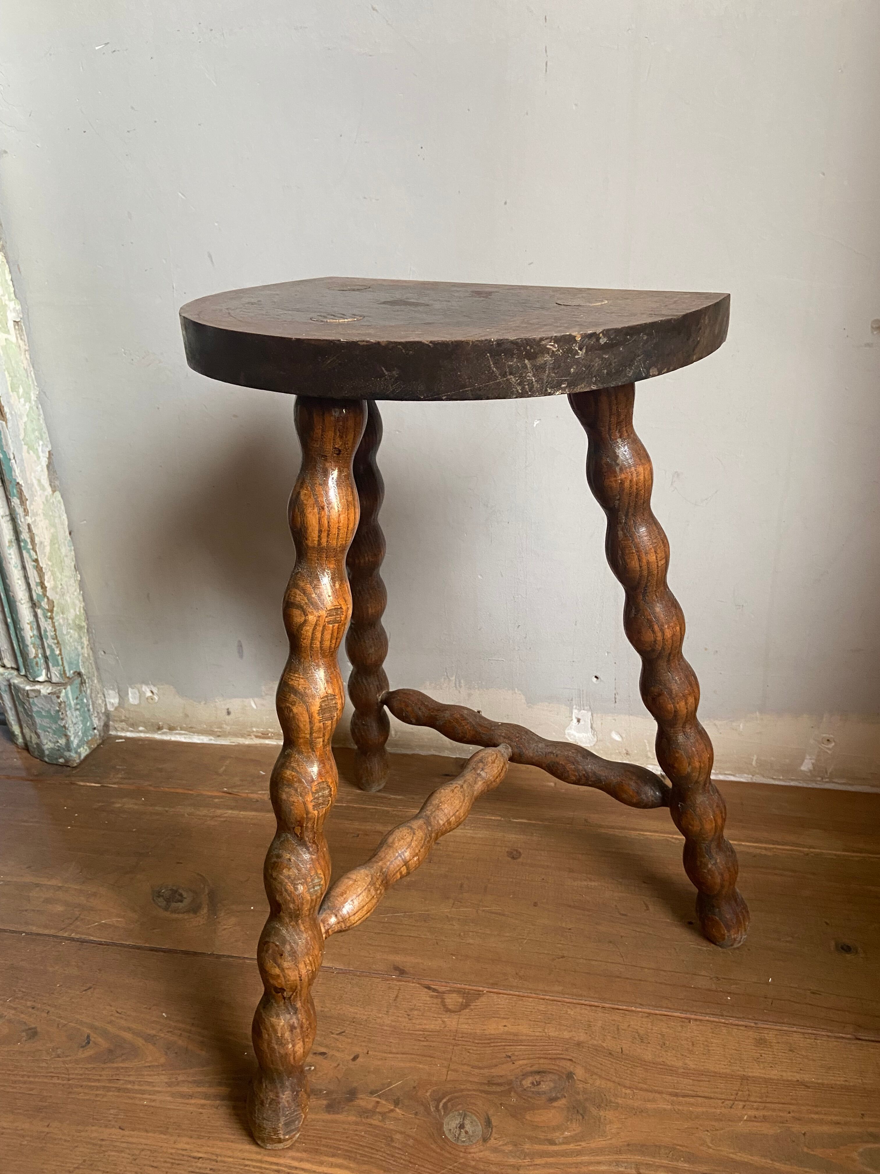 Pair of wooden milkman's stools turned brutalist