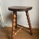 Pair of wooden milkman's stools turned brutalist