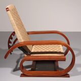 An exceptionally rare mahogany recliner crafted in Italy during the 1950s"