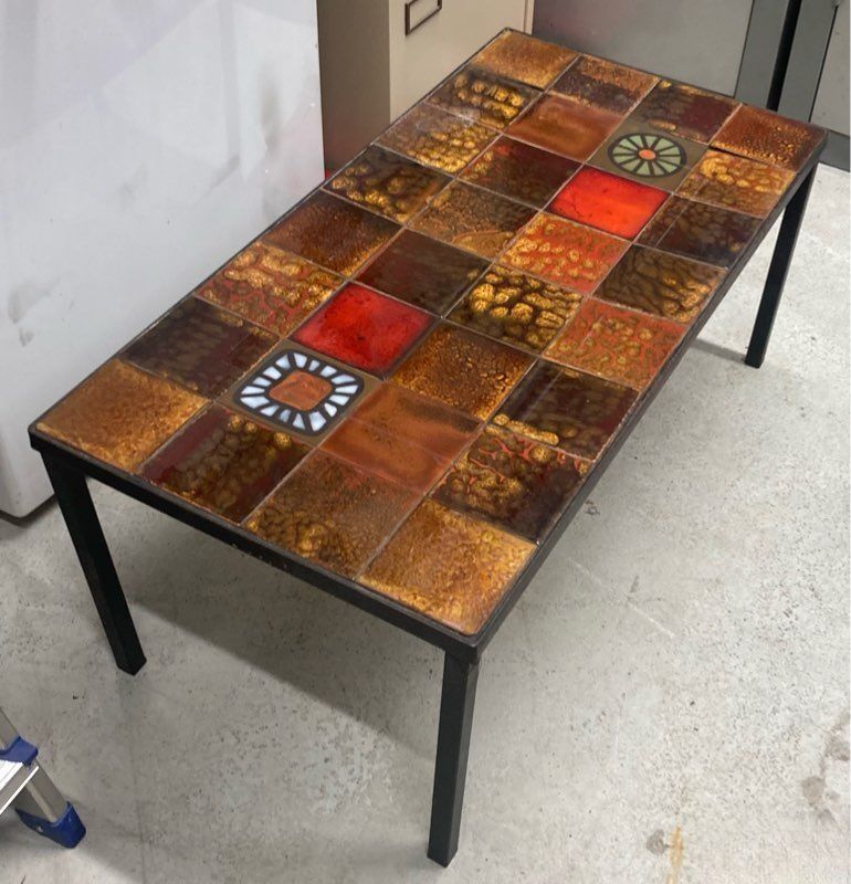 Vintage coffee table in ceramic with wrought iron structure from the 1970s.