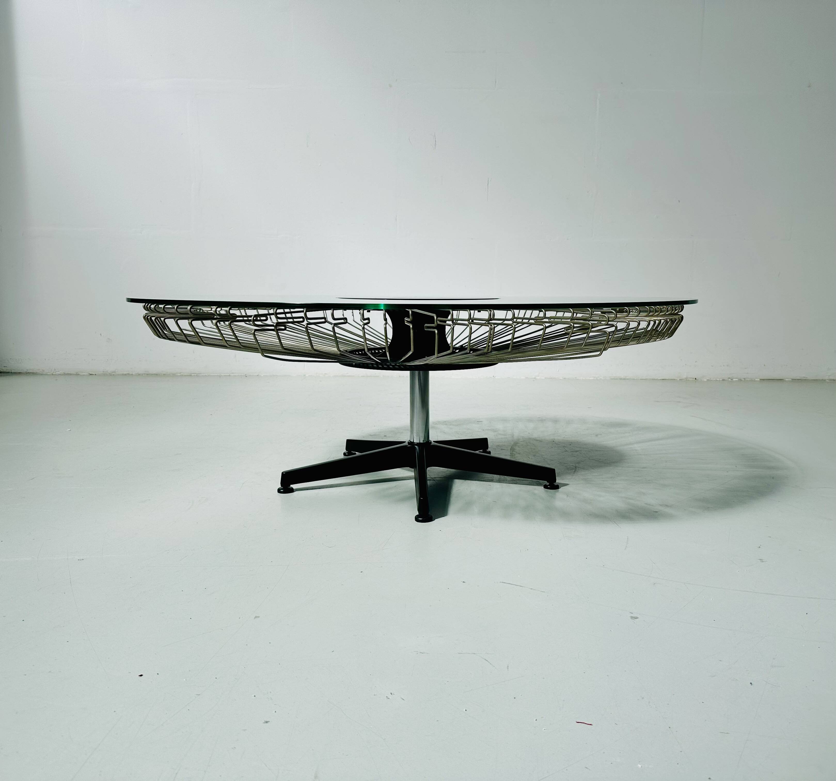 Italian rotating glass and metal coffee table designed for Prada, 1990s.