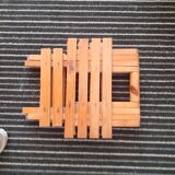Wooden foldable square stool.